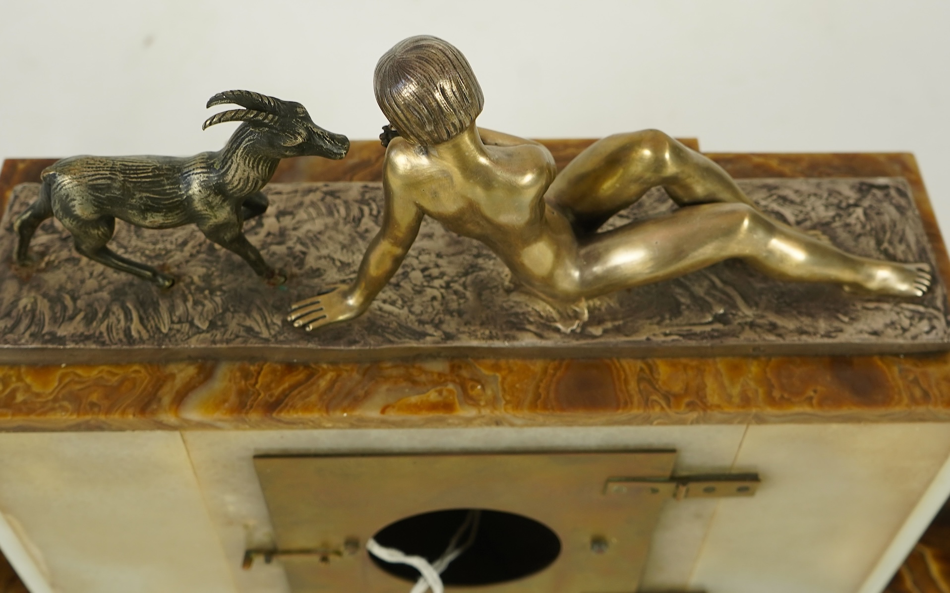 F.H. Danvin (French, 20th century), a marble and onyx clock